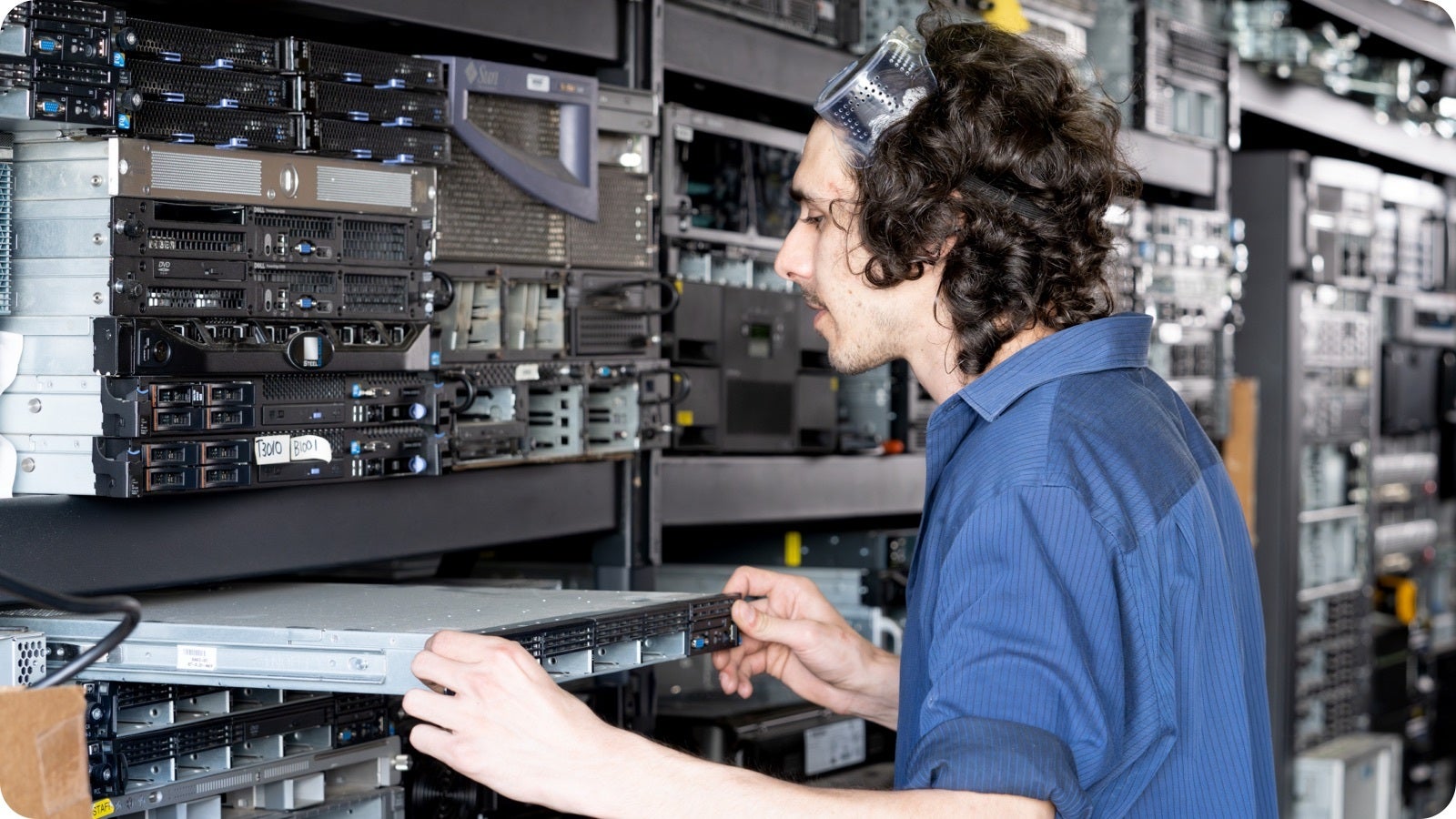 eBay Seller Jeff Abed adjusts computer technology