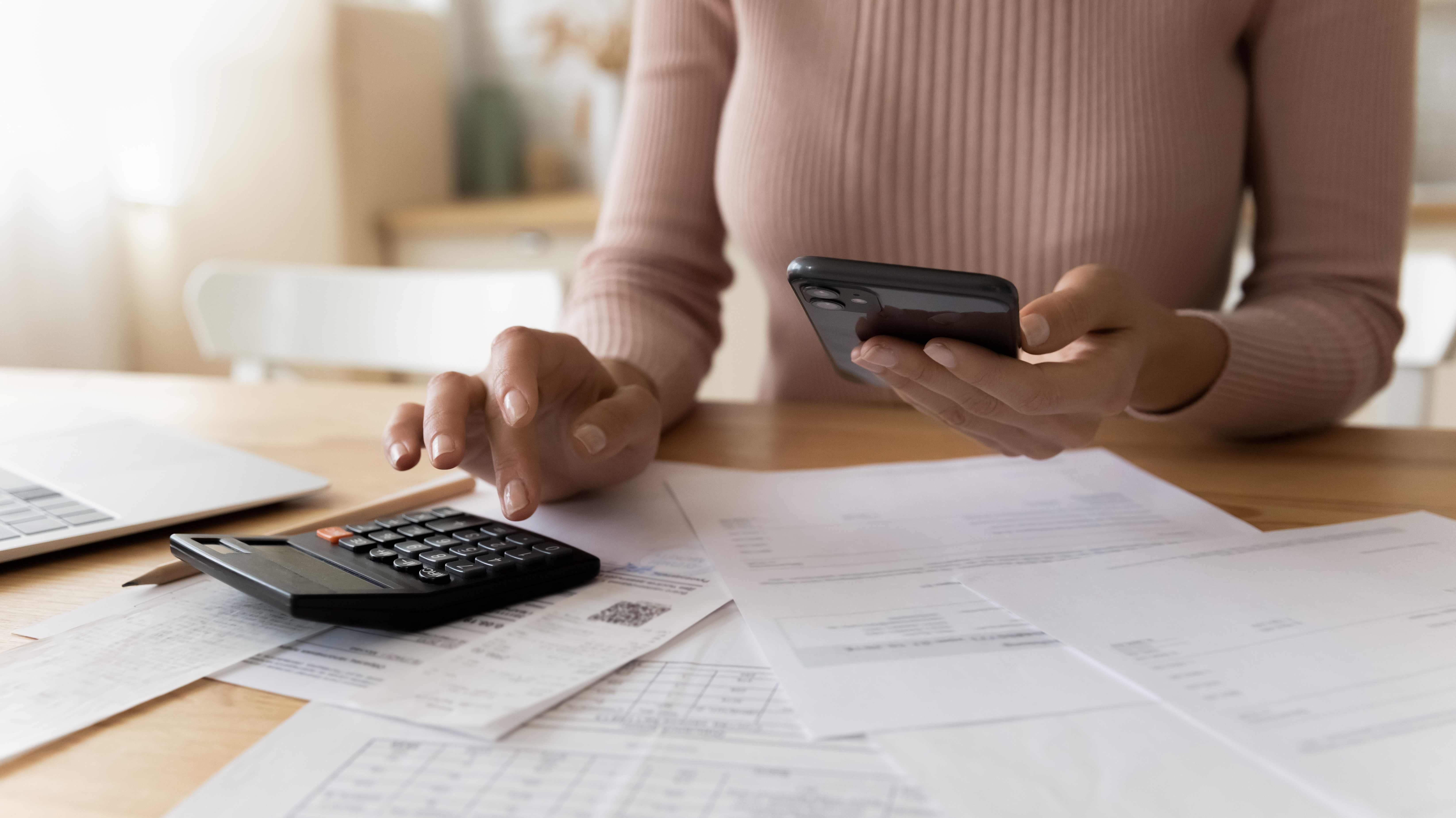 Woman calculating taxes