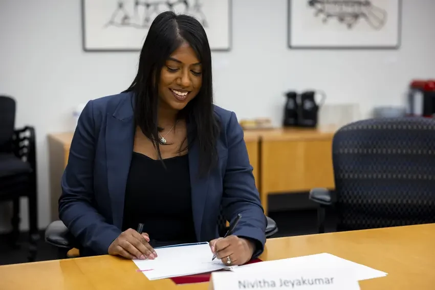 Nivitha Jeyakumar, Government Relations Lead, eBay Canada, signs the Canadian Product Safety Pledge.